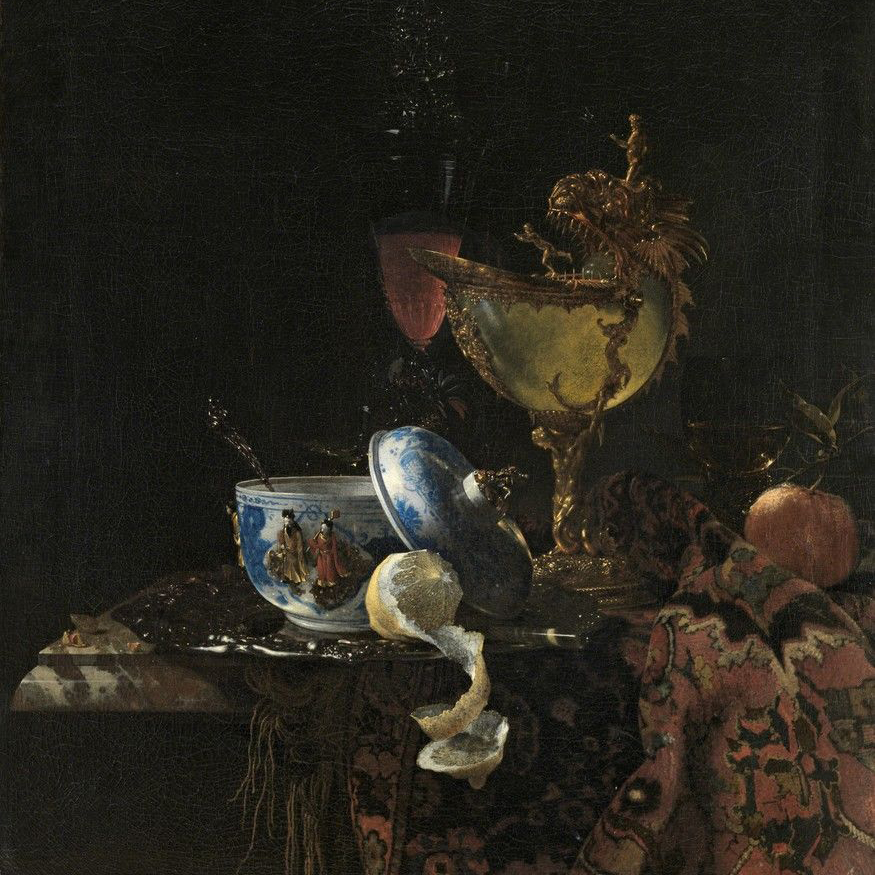 An early example of Dutch Golden Age
painting by Willem Kalf (1619-1693), entitled
Still Life with a Chinese bowl, a Nautilus
Cup and Fruit (1662).